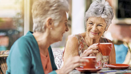 two old ladies drinking tea